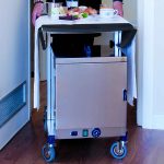 Room service table (MC. 1104-80N) shown with optional Stainless Steel Food Warmer (MC. A0003)